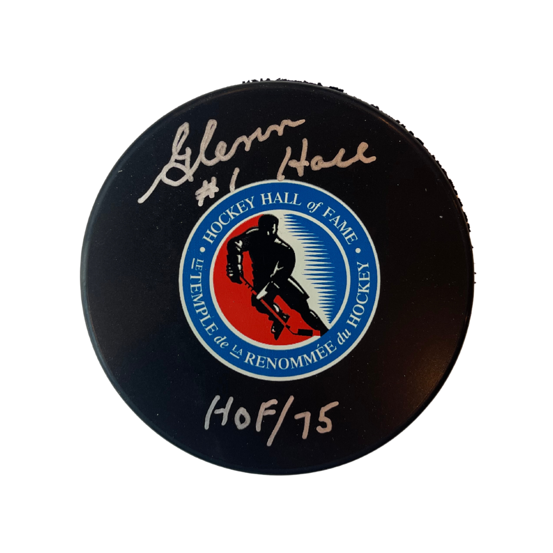 Glenn Hall St Louis Blues Autographed Hall Of Fame Puck w/ "HOF 75" Inscription - Fan Cave COA